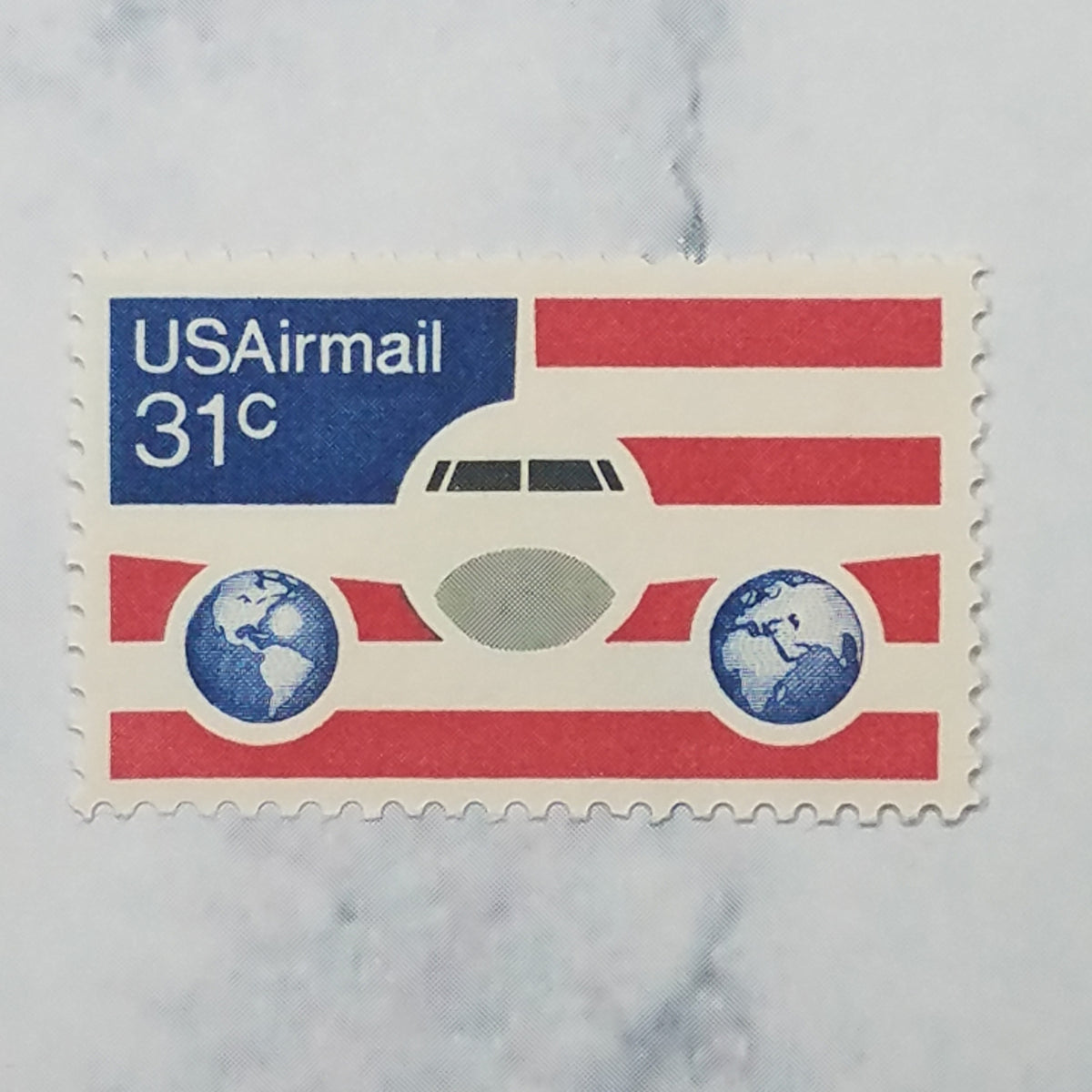 inviting vintage postage stamps of Airmail 31c inviting