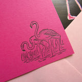 Flamingo letterpress stationery on dark pink paper by inviting letterpress boutique in austin texas.