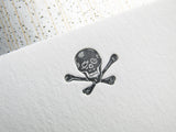 Letterpress skull stationery, printed in gray ink onto white cards. By inviting.