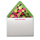 Letterpress love stationery, pink LOVE YOU LOTS text with lined green envelopes, by inviting letterpress in austin texas.