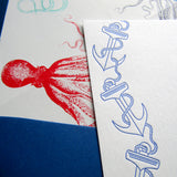 Letterpress nautical anchor stationery with octopus-lined envelopes, in blue ink, by inviting letterpress boutique in austin, texas.