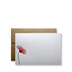 Letterpress lone poppy in red and black, half-tone, on white cards with brown envelopes, designed and printed by inviting in Austin, Texas.
