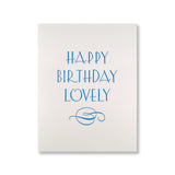 Letterpress birthday card reads "Happy Birthday Lovely" and has an elegant flourish.