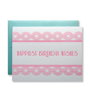 Letterpress art deco birthday cards that read "Happiest Birthday Wishes" in neon pink ink with shimmer aqua envelopes, by inviting in Austin, Texas.