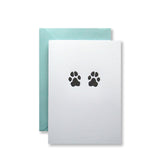 Letterpress dog paws folded note cards in black ink by inviting letterpress in austin texas.
