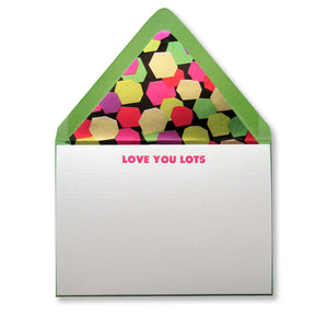 Letterpress love stationery, pink LOVE YOU LOTS text with lined green envelopes, by inviting letterpress in austin texas.